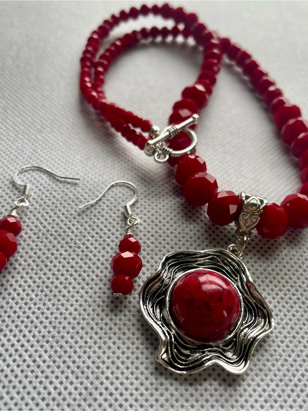 Red Beaded Necklace and Earrings Set with Silver Flower Pendant